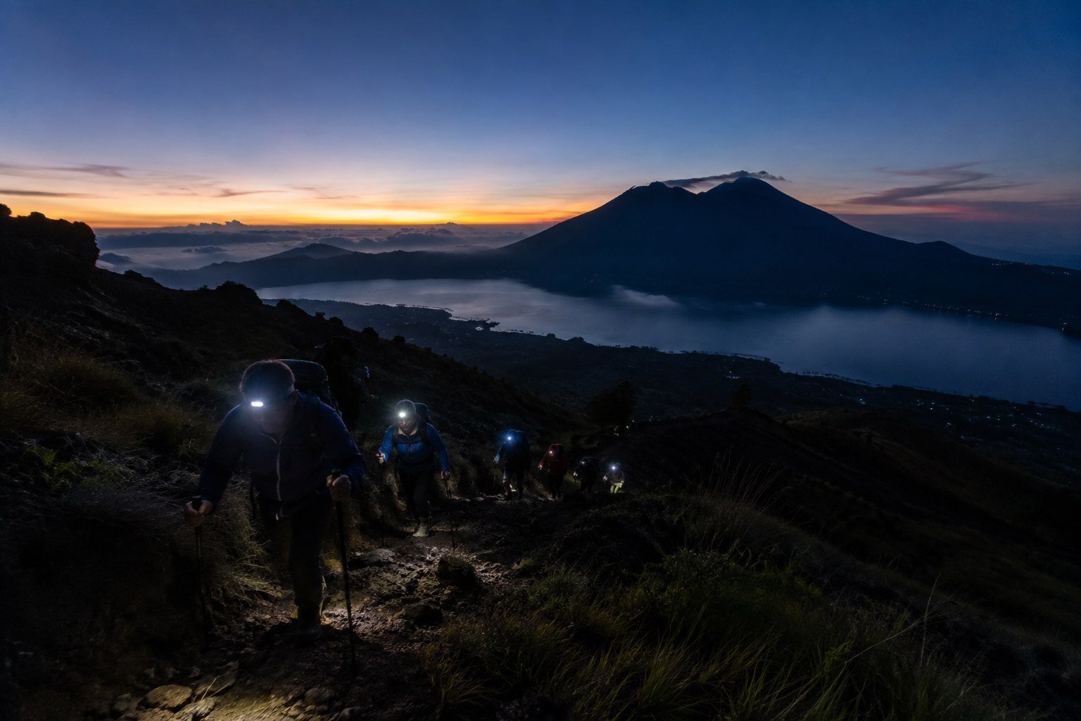 Mount Batur sunrise trekking start time and hikers beginning before dawn